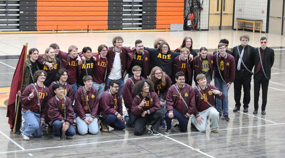 Greek month concludes with bridge crossing, skit night for members